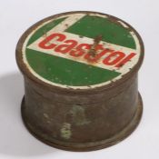 Castrol, a 1916 shell casing from a 4.5IN Howe I, with a Castrol design to the lid of the casing,