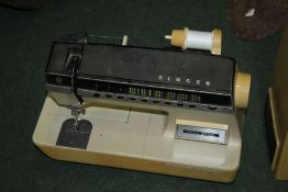 Singer Futura 2000 sewing machine, housed within a plastic carrying case