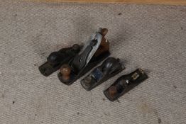 Four woodworking planes, to include Record No. 0120, Stanley No. 220, Acorn No.4, and Guys No.