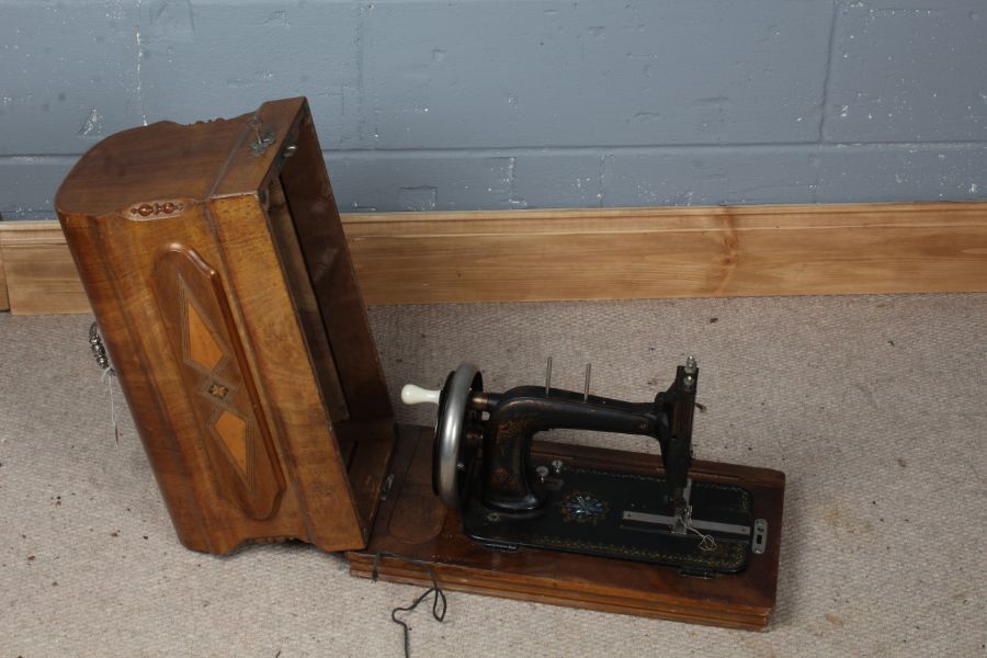 Albert List of Ipswich hand sewing machine, with abalone inlay, housed within a walnut case