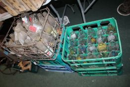 Five crates of various advertising milk bottles (5)