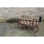 Rustic wooden wagon, with four wheels and carriage, 67cm wide