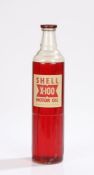 Shell X-100 Motor Oil glass bottle, with red oil and a numbered 30 cap, with contents