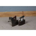 Two late 19th/ early 20th century iron boxes, each with wooden handles (2)