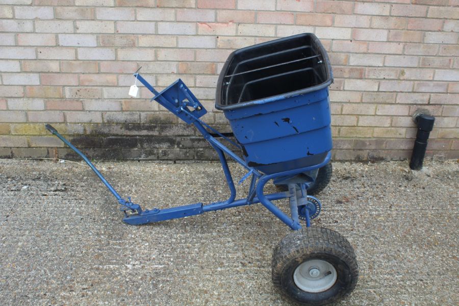Agricultural seed spreader in blue