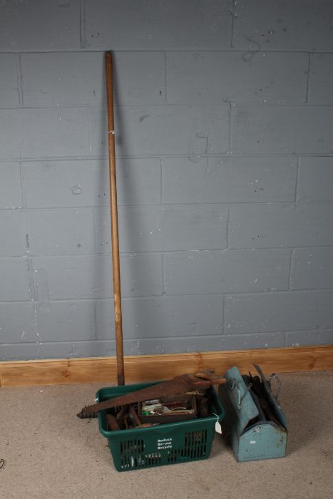 Cantilever tool box and a crate of various hand tools, saws, vice etc. and a wooden handled rake(