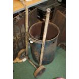Oil Barrel sack barrow, together with a blue oil barrel with central tap (2)