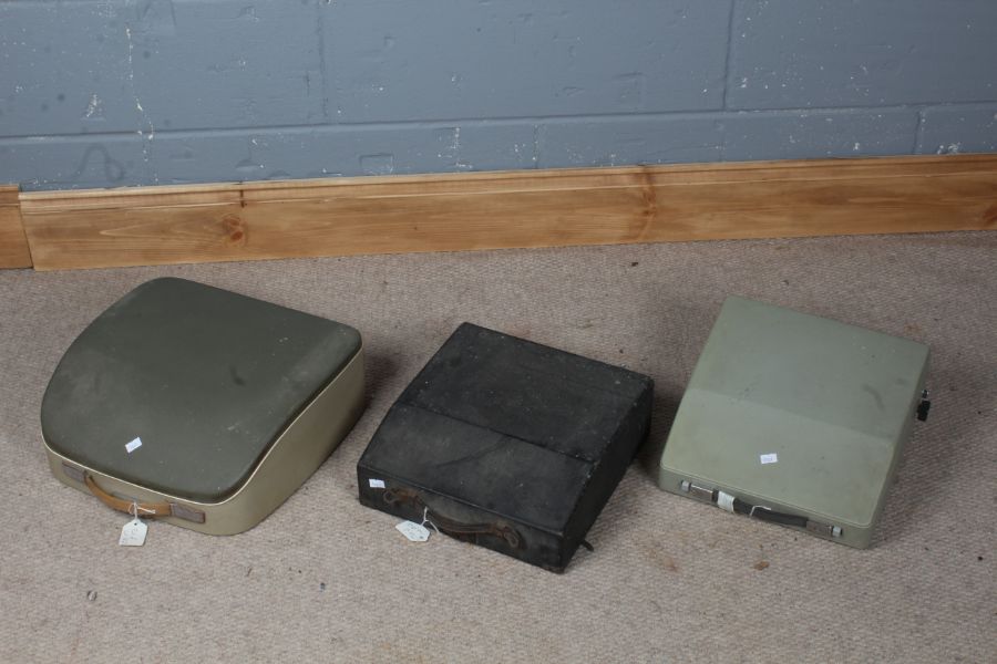 Three various portable typewriters, to include Olivetti, Remington and Signet (3)