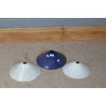 Blue enamel light shade, 25.5cm diameter, together with two milk glass shades, 25cm and 22.5cm