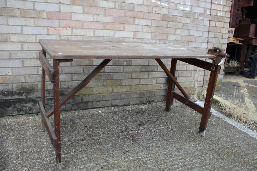 Pine folding trestle table with attached vice