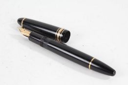 Montblanc Meisterstuck No. 146 fountain pen, the polished black body with gilt bands and 14 carat