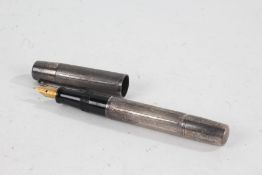 Waterman's 'Ideal' silver cased fountain pen, with engine turned case