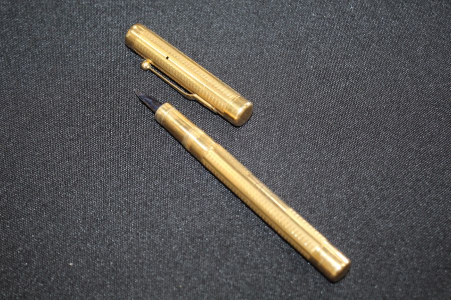 Mabie Todd 'Swan' fountain pen, with yellow metal case