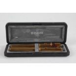 Parker gold plated two piece pen set, comprising fountain pen with 18ct gold nib and a ballpoint, in