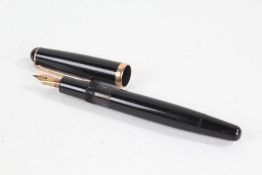 Montblanc No. 342 fountain pen, the black polished body with gilt banded cap and 14 carat gold nib