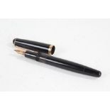 Montblanc No. 342 fountain pen, the black polished body with gilt banded cap and 14 carat gold nib