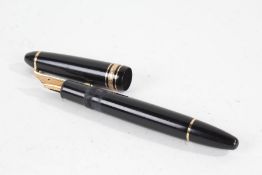 Montblanc Meisterstuck No. 146 fountain pen, the polished black body with gilt bands and 14 carat