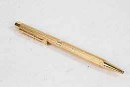 Sheaffer 18 carat gold case ballpoint pen, with engine turned decoration