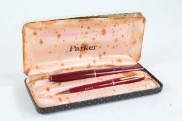 Parker 17 fountain pen, with matching propelling pencil, each with maroon cases, boxed (2)