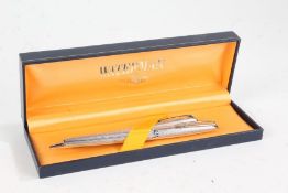 Waterman's French silver fountain pen and matching ball point pen, each with engine turned cases,