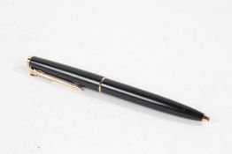 Montblanc ballpoint pen, the black body with gilt mounts and lever mechanism