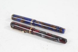 Burnham No. 51 fountain pen, with red, grey and gold marble effect case, together with a blue and