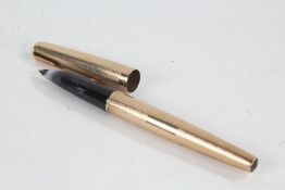 Parker 9 carat gold cased fountain pen, with engine turned decoration