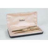 Parker 12ct rolled gold three piece pen set, comprising fountain pen, ballpoint and propelling