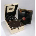 His Master's Voice portable gramophone together with case of 10" and 12" 78rpm shellac records,