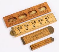 Rabone braille folding ruler, together with another folding example, a slide rule a and a New