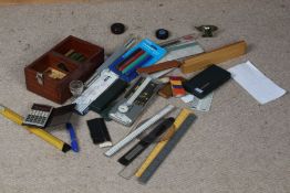 Collection of objects, to include rulers, pens, slide rules calculators, etc, (qty)