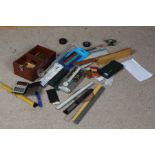 Collection of objects, to include rulers, pens, slide rules calculators, etc, (qty)