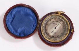 Dollond pocket barometer, with silvered dial, gilt brass case and housed within the leather case