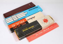 Slide rules, to include all metal slide rule by Pickett, another two by Pickett, Nestler slide