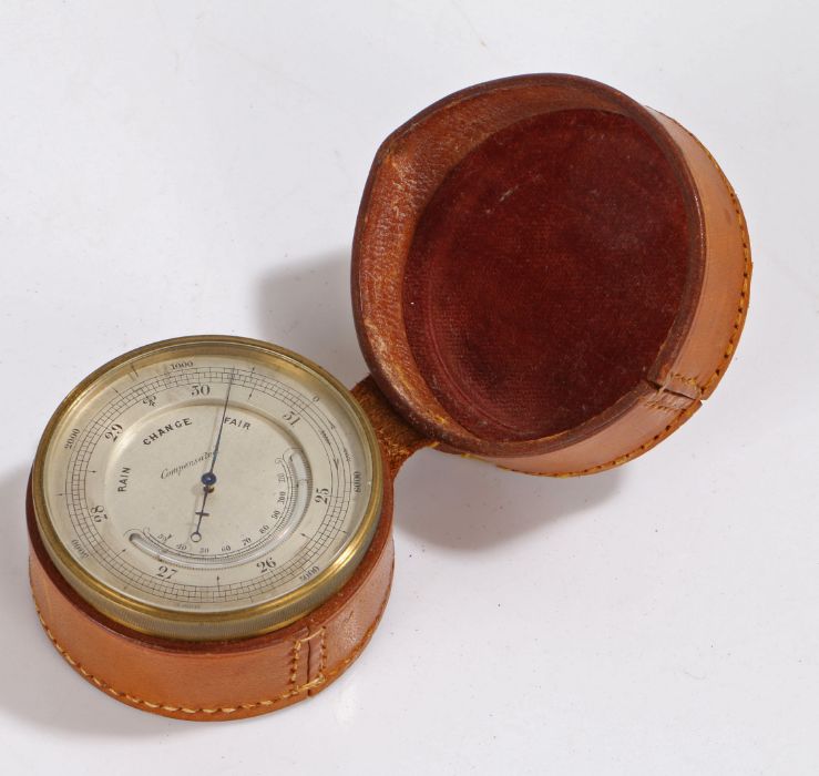 Late 19th/early 20th century handheld travelling barometer; the dial marked 'Compensated' leather