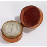 Late 19th/early 20th century handheld travelling barometer; the dial marked 'Compensated' leather