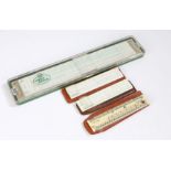 Faber Castell slide rule 2/83N, together with a Aristo slide rule, Andy-Square Armstrong Scale and a