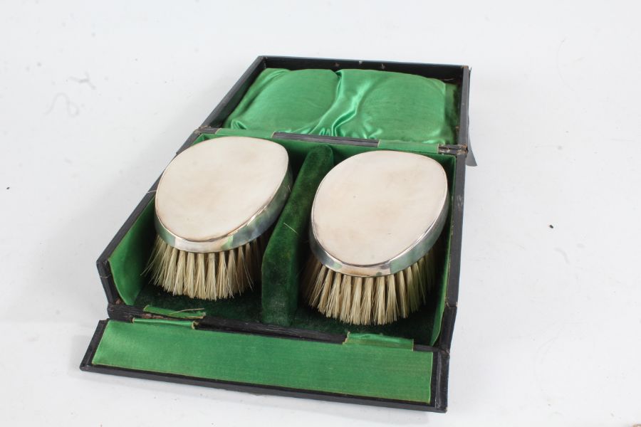 Pair of George V silver clothes brushes, Birmingham 1910, maker Charles S Green & Co Ltd. with plain