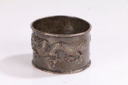 Chinese silver napkin ring, maker Hung Chong, with cast dragon decoration and heart shaped cartouche