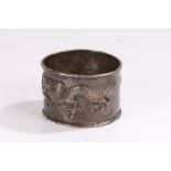 Chinese silver napkin ring, maker Hung Chong, with cast dragon decoration and heart shaped cartouche