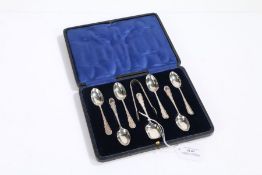 Set of six George V silver teaspoons together with sugar tongs and spoon, London 1916, maker