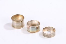 Three silver napkin rings, various dates and makers, 2.1oz (3)