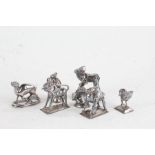 Collection of Indian white metal animals, to include camel, monkey, oxen, bird etc. (7)