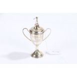 George VI silver twin handled golf trophy and cover, Birmingham 1948, maker A L Davenport Ltd, the