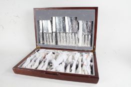 Canteen of Sheffield silver plated table cutlery, place settings for eight, housed in a canteen box