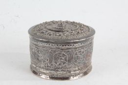 Indian white metal circular pot and cover, of cylindrical form, the embossed top with animal and