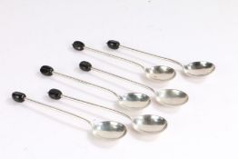 Set of six silver coffee spoons, Sheffield 1915, maker Asprey & Co Ltd, with black coffee bean