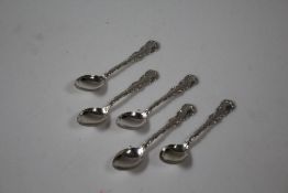 Five sterling silver coffee spoons, with scroll cast handles, 1.5oz