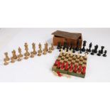 Early 20th Century travel folding chess board and set, with bone and red stained pieces, together