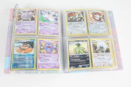 Collection of Pokemon cards, housed in an album, to include holographic cards, Dark Dragonite 15/